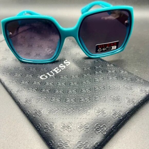 Guess GO00031 shiny turquoise, smoky gradient lenses with gold metal and plastic